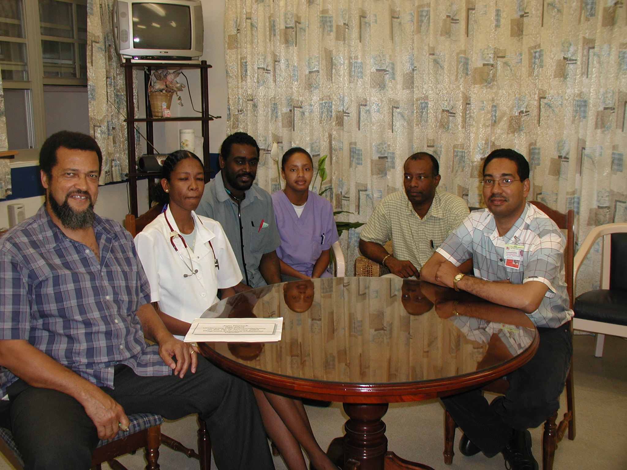 2002 visit to Dr. Wellington at the Mandeville Regional by Prof. MacFarlane and Dr. Irvine.